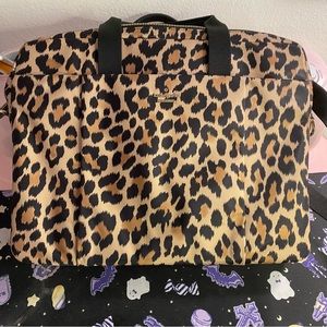 - Kate Spade Leopard Laptop Crossbody